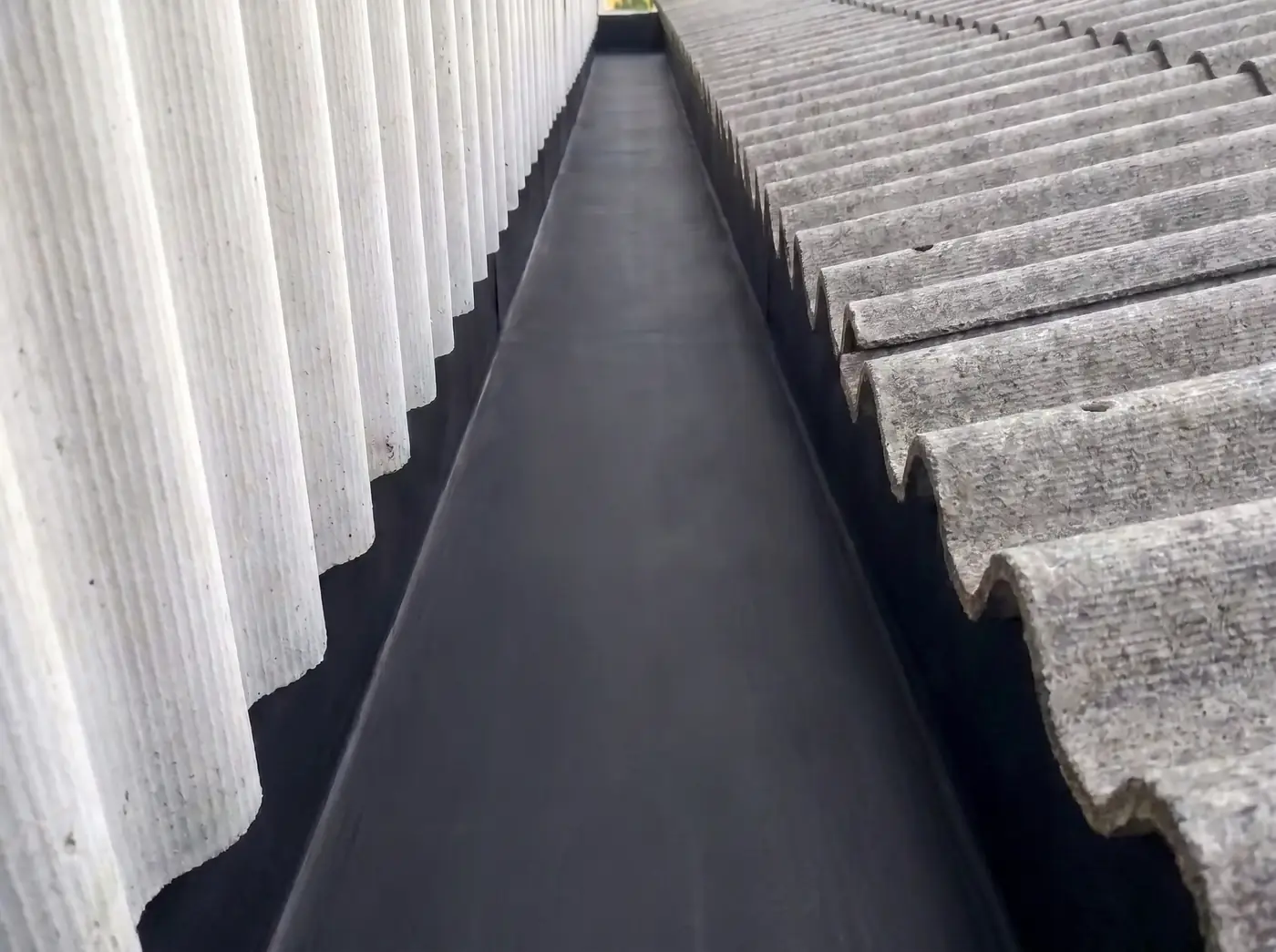 Roof valley gutter cleared and sealed in Gqeberha, completed by Under Pressure